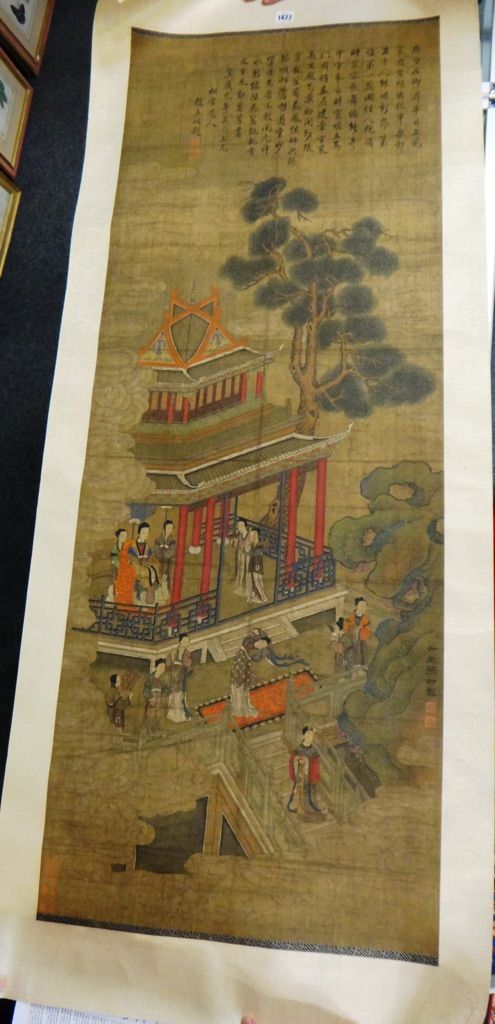 A Chinese scroll painting, 19th/20th century, ink and colour on paper, depicting ladies in a garden pavilion, 142cm. by 53cm.