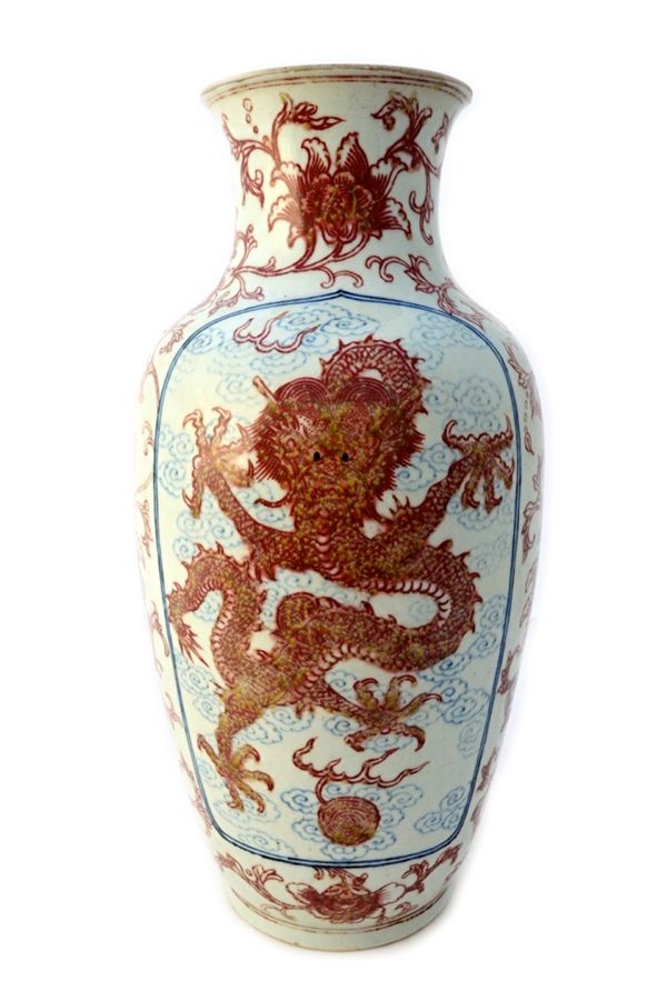A rare Chinese porcelain vase, late 18th century, of ovoid form with short waisted neck, painted on one side in underglaze-red with a five-clawed drag