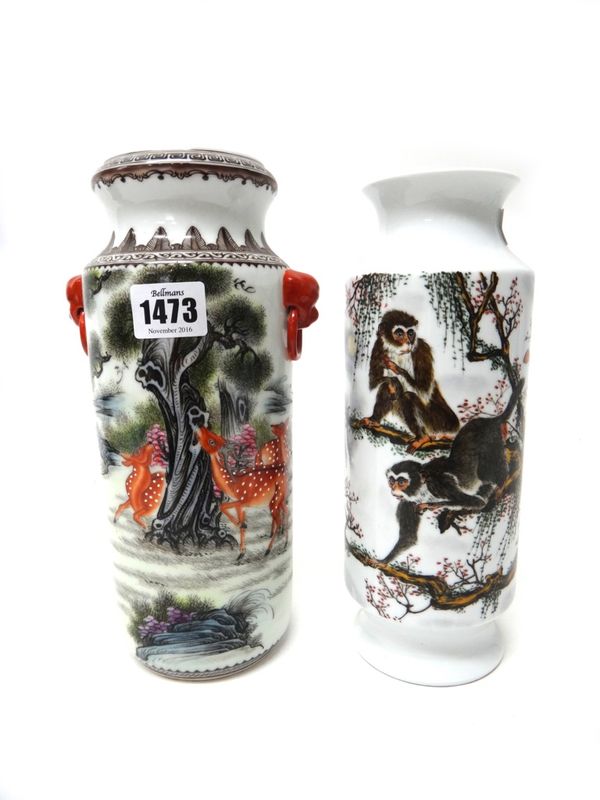 A Chinese porcelain cylindrical vase, 20th century, painted with deer in a landscape, the reverse with calligraphy, apochryphal Qianlong seal mark, 25