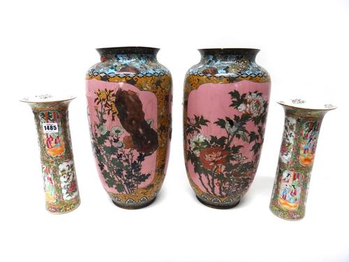 A pair of Canton famille-rose beaker vases, late 19th century, painted with panels of figures and birds in branches, (a.f); and a pair of Japanese pin