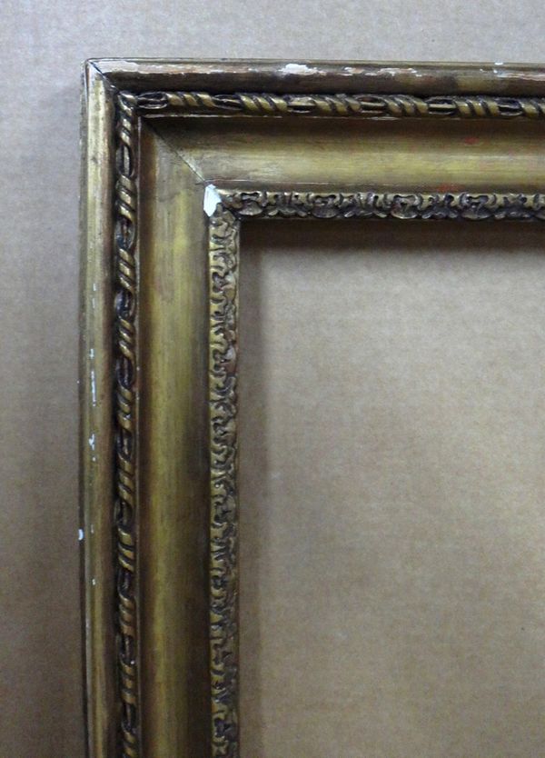 A modern gilt plaster frame of plain form with running pattern to the edges, aperture 122cm x 92cm.