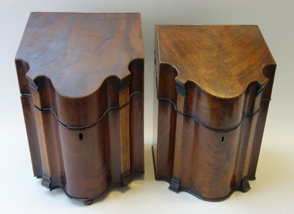 A near pair of George III inlaid mahogany slope top knife boxes, with shaped serpentine front and original fitted interior, 23cm wide and 25cm wide (2