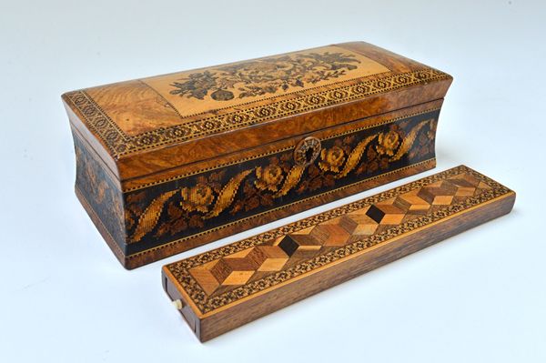 A 19th century Tunbridge ware glove box of sarcophagus form, 25cm wide, together with a Tunbridge ware deceptive cube inlaid pin box, 24cm wide (2). I