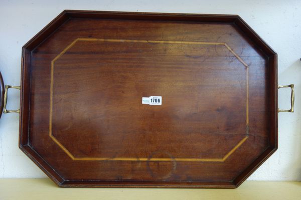 A 19th century inlaid mahogany tray of canted rectangular form, with brass handles, 70cm wide.