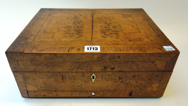 A 19th century pollard oak sewing box, the rectangular lift top revealing a fitted interior, 35cm wide.