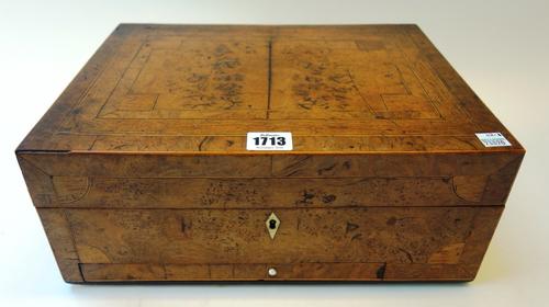 A 19th century pollard oak sewing box, the rectangular lift top revealing a fitted interior, 35cm wide.