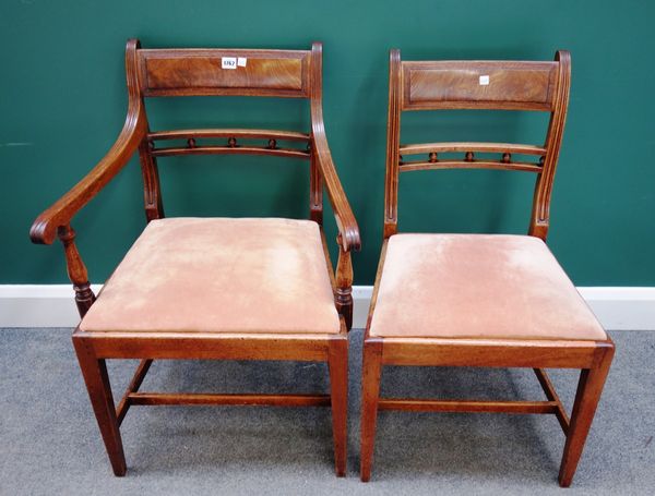 A set of eight 19th century mahogany dining chairs, each with spindle mounted waist rail on tapering square supports, to include a pair of carvers (8)