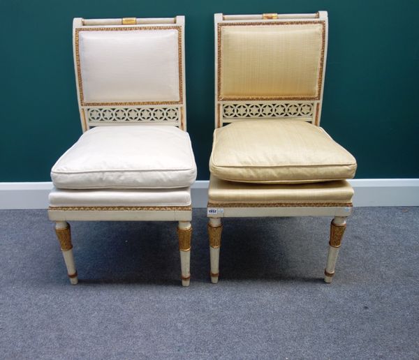 A set of six early 19th century Italian parcel gilt cream painted side chairs, with turned crest rail and star cut waist rail, on acanthus carved turn