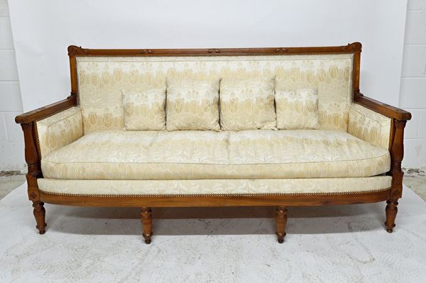 Jacob Desmalter; a suite of early 19th century French mahogany seat furniture, to comprise; a sofa, 196cm wide, and a pair of armchairs, all with bow