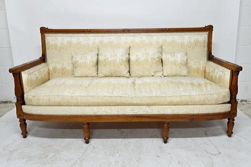 Jacob Desmalter; a suite of early 19th century French mahogany seat furniture, to comprise; a sofa, 196cm wide, and a pair of armchairs, all with bow