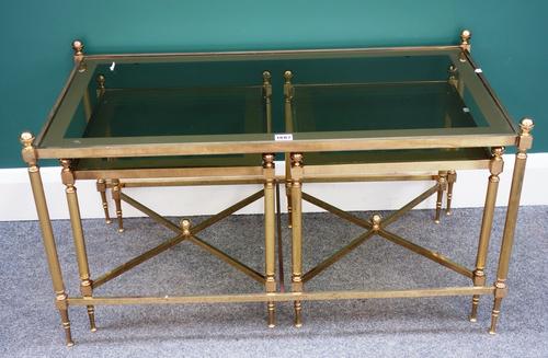 A 20th century lacquered brass and glass rectangular coffee table, with ball finials on reeded supports, 90cm wide, together with a matching pair of s