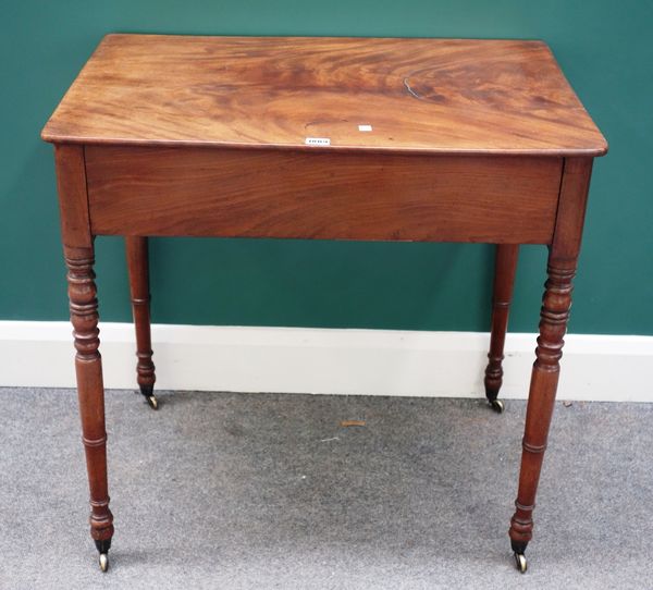 An early 19th century mahogany side table, with single flush fit drawer on turned supports, 76cm wide.