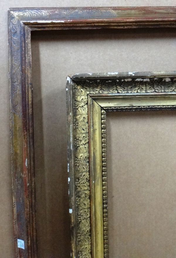 A 19th century gilt plaster frame and a 20th century gilt plaster frame, the larger aperture 142cm x 95cm.(2)  EXTRA