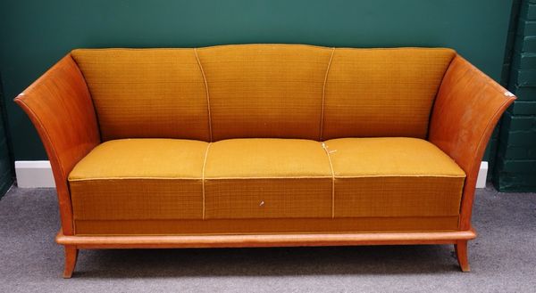 A mid 20th century oak sofa, with outswept arms on splayed supports, 182cm wide.