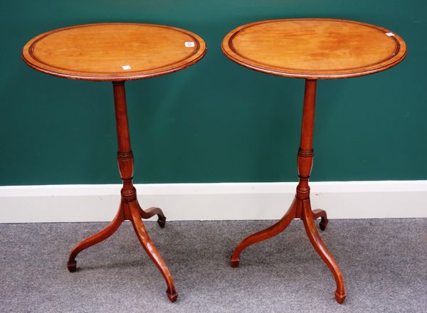 A pair of 19th century satinwood occasional tables, each with inlaid oval top on tripod base, 47cm wide.