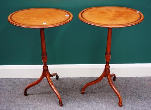 A pair of 19th century satinwood occasional tables, each with inlaid oval top on tripod base, 47cm wide.