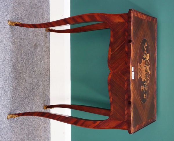 A 19th century inlaid kingwood writing table, the shaped top over single fitted frieze drawer, on gilt metal mounted slender cabriole supports, 54cm w