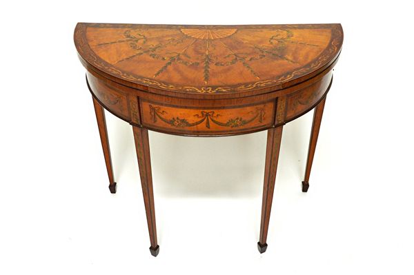 S & H Jewell; a marquetry inlaid satinwood card table, with semi-elliptic foldover top on tapering square supports, 91cm wide. Illustrated.