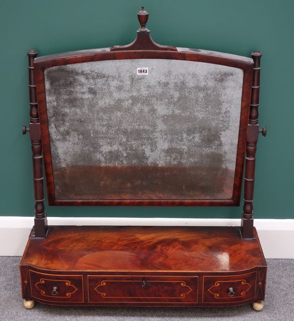 A large William IV inlaid mahogany toilet mirror, with bowfront three drawer base, 75cm wide.