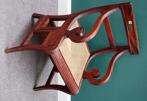 A Regency style mahogany metamorphic library armchair/steps, on sabre supports.