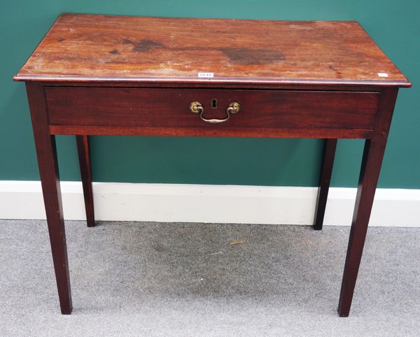 An 18th century mahogany single drawer writing table, on tapering square supports, 83cm wide. Property from the estates of the late Adrian Stanford an