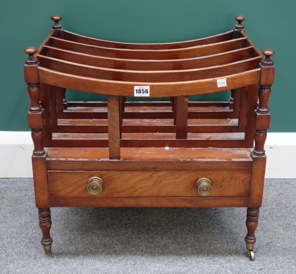 A 19th century mahogany Canterbury with four concave divisions over single drawer on turned supports, 50cm wide.Property from the estates of the late