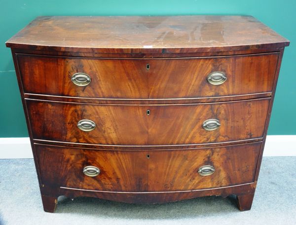 A Regency mahogany bowfront chest of three long graduated drawers, on bracket feet, 108cm wide.