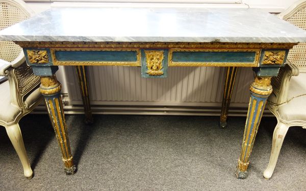 A Louis XVI console, the associated grey marble top on a parcel gilt blue painted base, with four tapering fluted supports, 127cm wide.