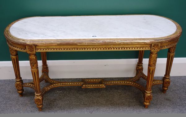 A Louis XVI style giltwood 'D' ended occasional table with inset white marble top, on six legs with under stretchers, 100cm wide. Property from the es