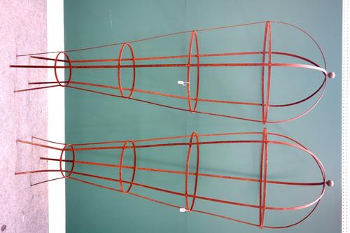 A pair of early 20th century wrought iron hot air balloon shaped flower climbing frames, 58cm wide x 228cm high (2).