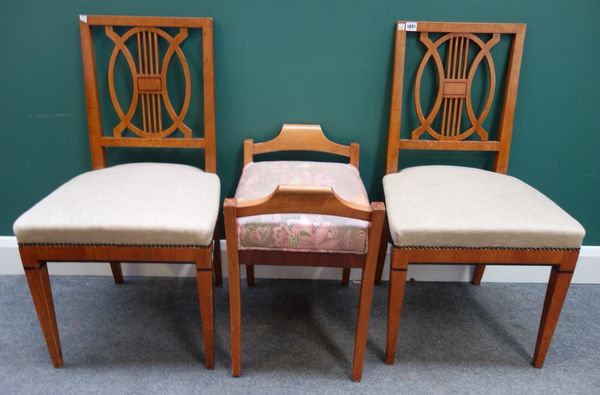 A pair of Biedermeier birch square back side chairs, together with a similar stool, 56cm wide.