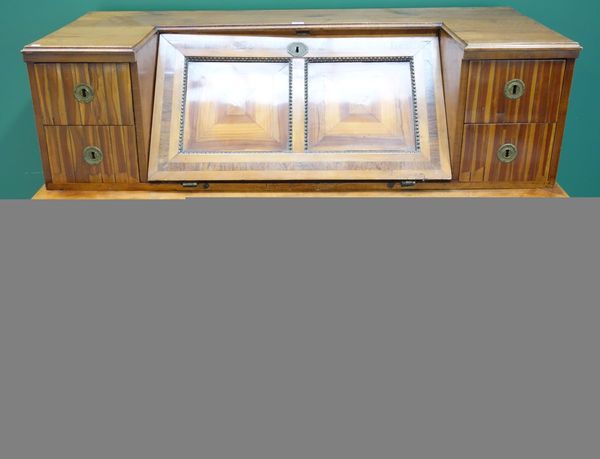 A German 18th century fruitwood, walnut and ebonised line inlaid bureau, circa 1790, the fall enclosing a fitted interior, flanked by four short drawe