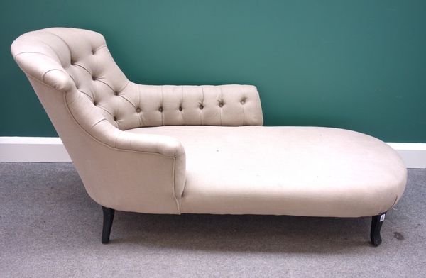 An early 20th century French tub back chaise longue on splayed ebonised supports, 180cm wide.