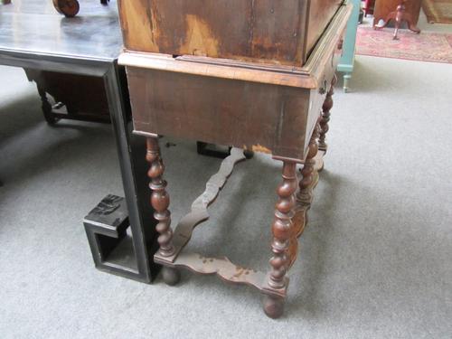 A late 19th century French gilt metal mounted marquetry inlaid mahogany occasional table, the shaped circular top on four cabriole supports, united by