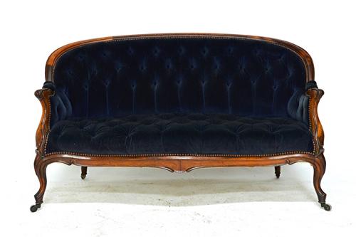 A pair of late 19th century French rosewood framed tub back sofas, with serpentine seats, on cabriole supports, 140cm wide. Illustrated.