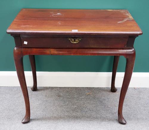 A mid-18th century mahogany single drawer side table on slender cabriole supports and pointed pad feet, 80cm wide.