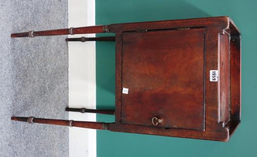 A George III mahogany tray top night table with single door on tapering ring turned supports, 36cm wide.