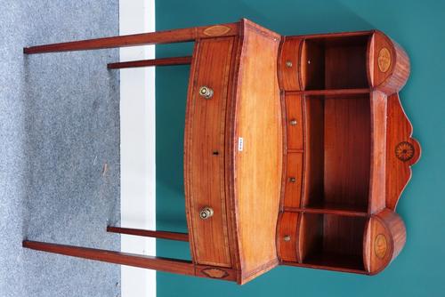 A late 19th century crossbanded inlaid satinwood bonheur du jour, the concave fitted superstructure over pull out writing drawer on tapering square su