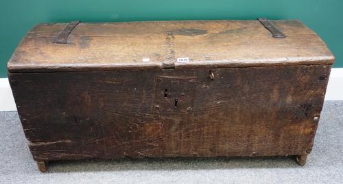 An oak five plank coffer of primitive construction, with strap work hinges, probably 16th century, 92cm wide.