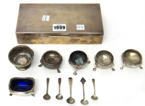 A silver rectangular table cigarette box, wooden lined within, the exterior detailed Sterling Silver, two pairs of Victorian silver salts, London 1874