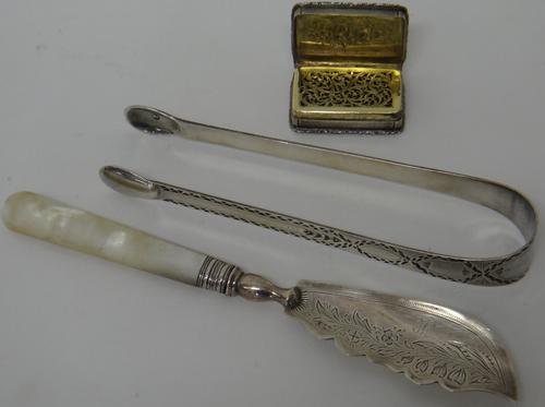 Silver and silver mounted wares, comprising; a rectangular vinaigrette, the exterior with engine turned decoration within moulded borders, gilt within