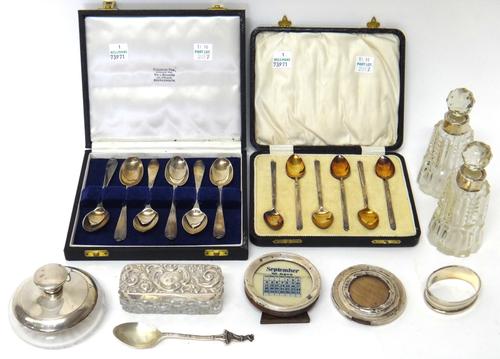 Silver and silver mounted wares, comprising; a set of six coffee spoons, Birmingham 1925, cased, a set of six coffee spoons, London 1945, cased, two g