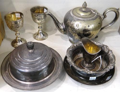 A Victorian silver helmet shaped cream jug, with engraved decoration, London 1863, weight 102 gms and plated wares, comprising; a bottle coaster, with