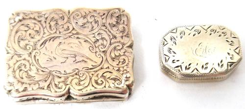 A Victorian silver shaped rectangular vinaigrette, with a floral and scroll engraved and pierced grille, by Nathaniel Mills, Birmingham 1839 and a Geo