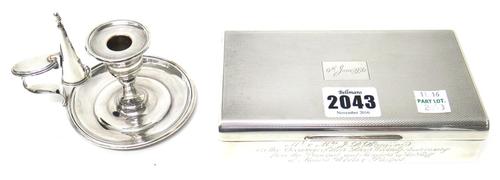 A silver rectangular table cigarette box, wooden lined within, the hinged lid with engine turned decoration, otherwise presentation inscribed, Birming