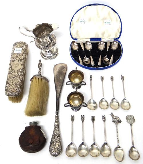 Silver and silver mounted wares, comprising; a George III cream jug, with floral embossed decoration, London 1774, eight teaspoons, the handles with A