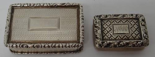 A late William IV silver rectangular vinaigrette, the exterior with engine turned decoration within floral moulded borders, maker Edward Smith, Birmin