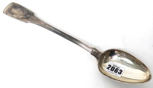 A late George III silver double struck fiddle and thread pattern basting spoon, crest engraved, London 1819, weight 150 gms.