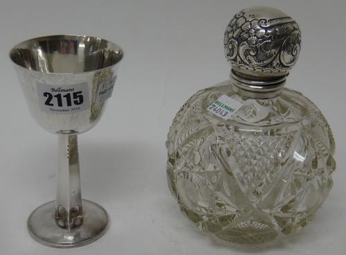 A silver pedestal goblet, with a beaten finish, with a tapering square section stem and on a circular foot, height 12.5cm, London 1972, weight 141 gms