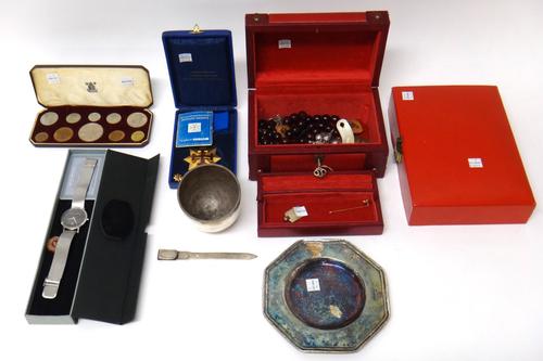 An Italian tumbler, detailed 800, a book marker, detailed 800, an Italian plated octagonal dish, a pendant tag, detailed 800, an Elizabeth II 1953 ten